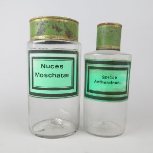 Apothecary jars with green labels
